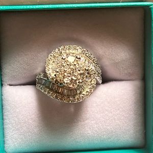 2.5ctw diamond swirl cluster ring set in 10k white gold. Size 7.